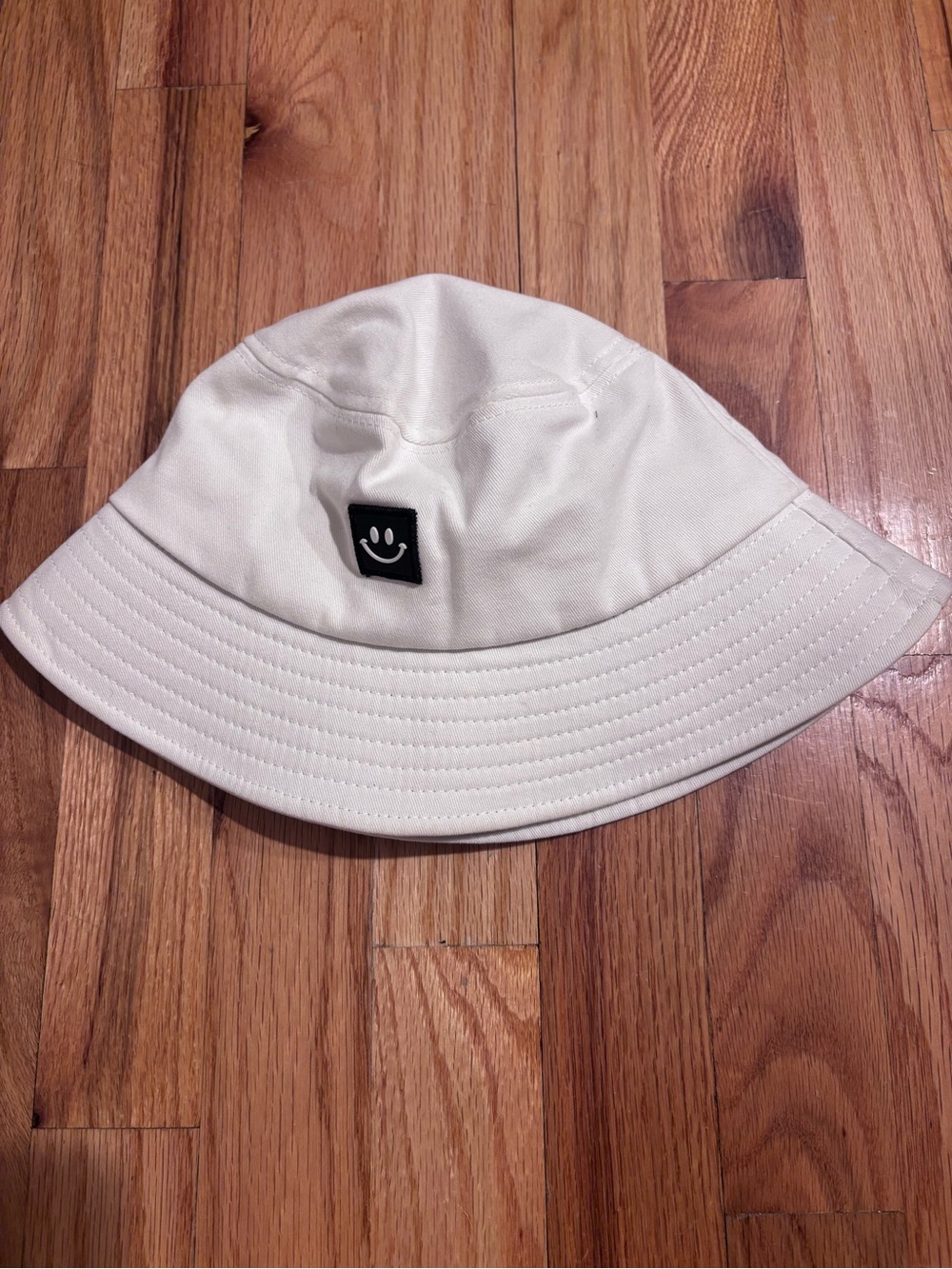 White Bucket Hat with Smiley Patch